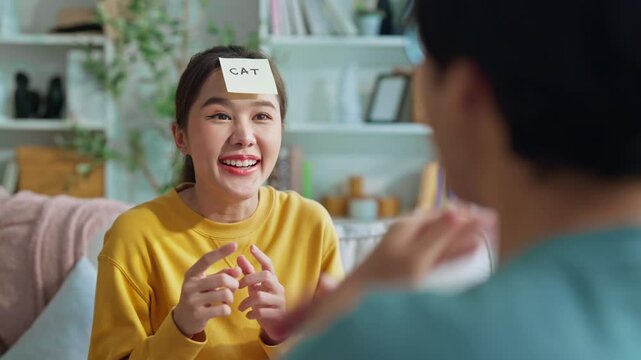 happiness fun and cheerful moment husband and wife playing paper quiz fun game together at home funny hobby sunday morning game positive good vibes positive relation concept at home lifestyle