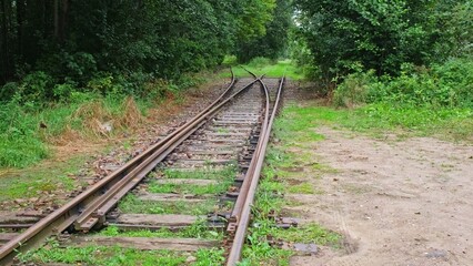 Fototapeta premium Railway Junction Switch Splitting or Merging Track into Separate Routes