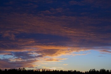 Obraz premium Magical sunset in winter in January over Bredebolet in Skaraborg in Vaestra Goetaland in Sweden on a cold day