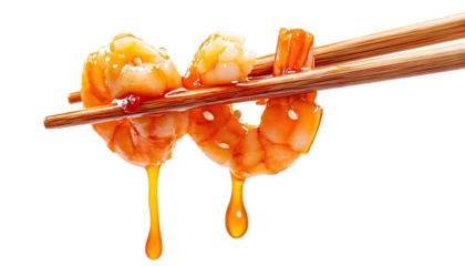 Delicious, juicy shrimps held by chopsticks, dripping soy sauce, cut out