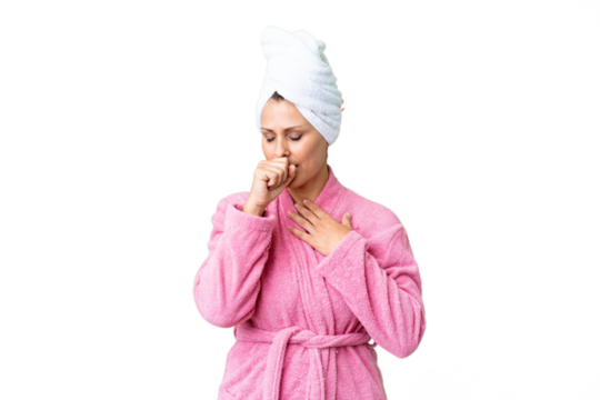 Middle age caucasian woman in a bathrobe over isolated background is suffering with cough and feeling bad