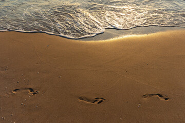footprints on the beach