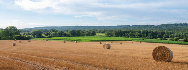 straw bales in countryside between french towns of st quentin and laon
