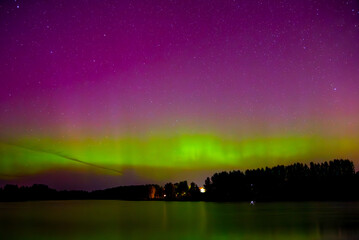 beautiful northern lights in the lake box on a clear autumn night