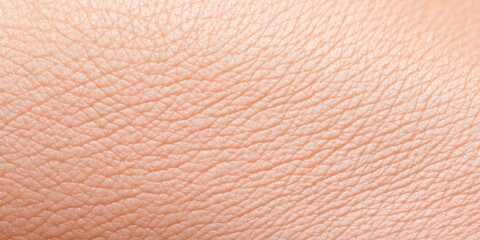 A close up of a person's arm with a tan skin tone