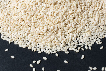 Macro kernels of white roasted sesame seeds.