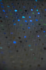 Obraz premium Natural colored diamonds glowing in the dark. Of 10,000 colourless or pale diamonds, only 1 is classed as fancy colored. Some diamonds of this collection glow fluorescent blue under ultraviolet light