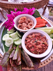 The Meat and Tomato Spicy Dip with pork scratchings and vegetable (Thai name is Nam prik ong)
