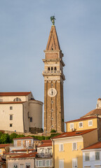 Fototapeta premium Bell tower of the St. George's Parish Church in Piran old town, Slovenia.