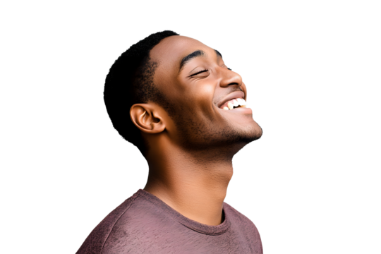 Close up profile happy young African American man laughing against gray background