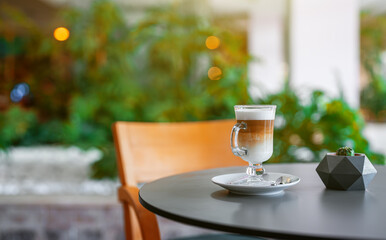 Coffee latte in a cafe on a table.