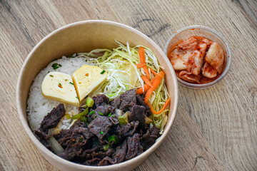 Korean food with beef and egg heart and rice