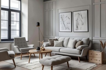 Light Gray Fabric Sofa with Footstool and Matching Chairs in Scandinavian Living Room with White Walls and Wooden Coffee Table
