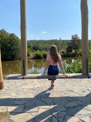 girl sitting on the swing