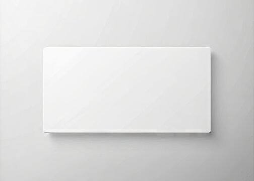 A blank, white rectangle with a subtle texture, devoid of any image or content, symbolizing emptiness, absence, or a lack of information.