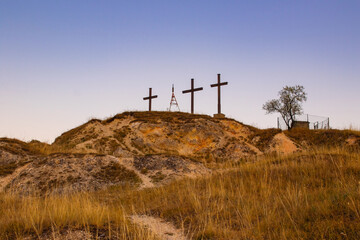 Three wooden crosses on top of Wind Mountain, Szél-hegy, (Windberg, Plutiberg)Solymár Hungary in the blue hour.