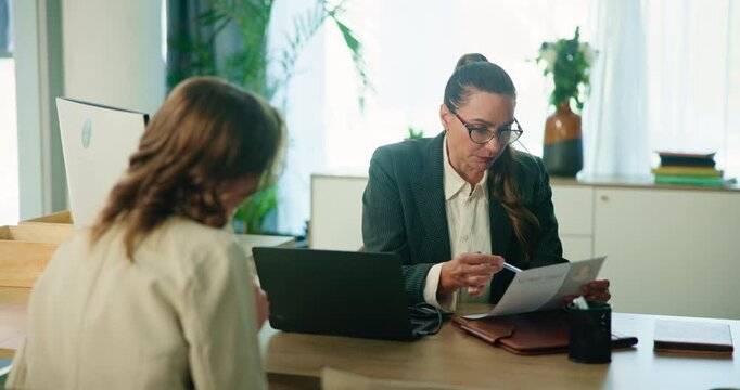 Business woman, lawyer and meeting with client for labor law, document or legal agreement at office. Female person, attorney and applicant with paper for compliance, court case or advice at workplace