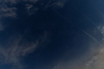 cloudy night sky with stars