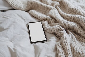 Modern Smartphone on Luxurious Bed with Blank Screen - High Resolution Product Photography