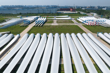 view of blades of wind power turbine in field