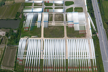 view of blades of wind power turbine in field