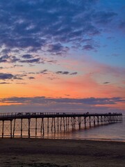 Obraz premium Pier silhouette in sunset