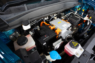 Electric car engine under hood. electric vehicle high power and environment. Battery pack in EV electronic car. Motor engine for vehicle car in future