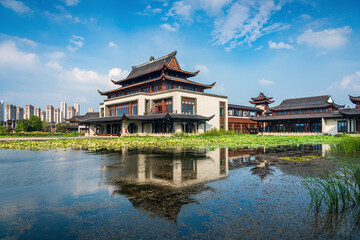 Traditional Asian Building by Tranquil Lake