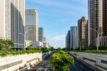 Vibrant Urban Cityscape with Lush Greenery and Modern Architecture