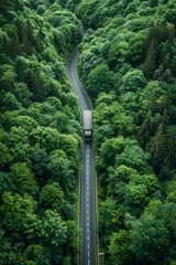 Aerial perspective of sustainable transport  car and hydrogen truck on highway through green forest
