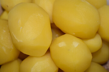 Boiled potatoes close-up. Background of peeled boiled potatoes.
