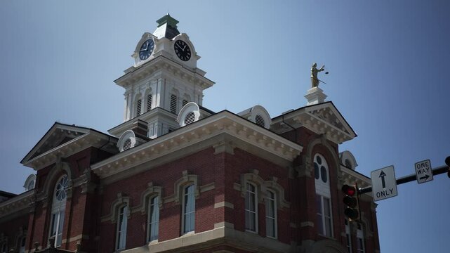 Turning view of Athens County Common Pleas Courthouse in the small midwest town of Athens, Ohio.