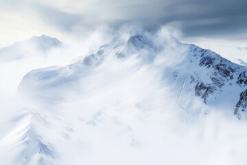 Snowy mountain peaks under cloudy skies with snowflakes