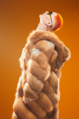 glamorous woman in fur coat