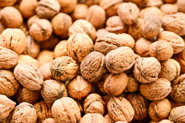 Walnuts, nuts at Holesovice Market, Holesovicka trznice in Prague, lively marketplace with stalls selling fruit, vegetables, flowers, herbs, spices, cheese and baked goods in Prague, Czech Republic