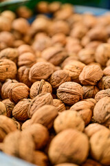 Walnuts, nuts at Holesovice Market, Holesovicka trznice in Prague, lively marketplace with stalls selling fruit, vegetables, flowers, herbs, spices, cheese and baked goods in Prague, Czech Republic