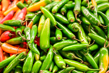 at Holesovice Market, Holesovicka trznice in Prague, lively marketplace with stalls selling fruit,...