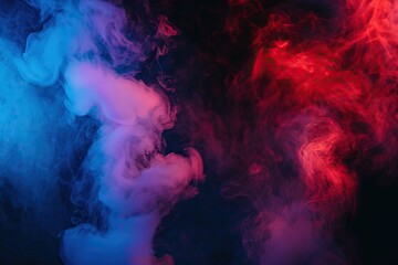 Obraz premium Artificial smoke in red blue light on black background in darkness