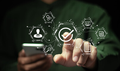 Businessman checking quality assurance and approval for service guarantee, certification, standardization, quality control and service approval concept..