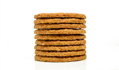 Stack of biscuit cookies stack isolated on white background