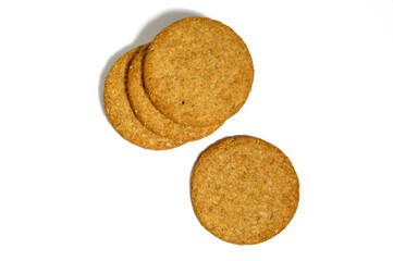 crunchy oat and wholemeal biscuits isolated on white.