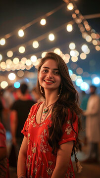 young indian woman standing at family function