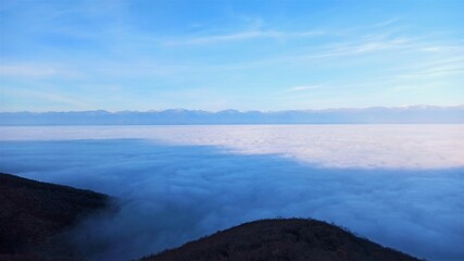 Misty Alazani Valley and the Caucasus Mountains