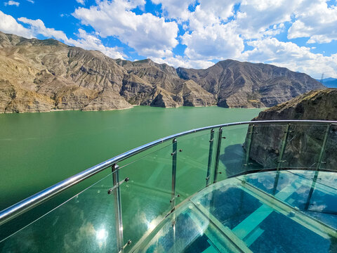 Seyir Terasi or Panoramic view of Tortum Lake from glass terrace in Erzurum, Turkey, with mountainous backdrop