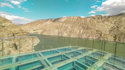 Seyir Terasi or Panoramic view of Tortum Lake from glass terrace in Erzurum, Turkey, with mountainous backdrop