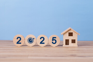 2025 New year property investment concept. Wooden blocks spell 