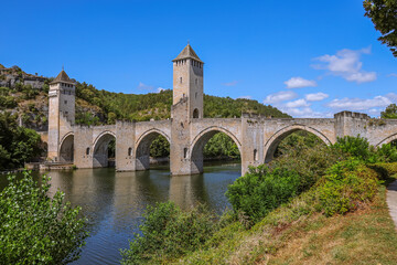 Valentré Bridge is a 14th-century six-span fortified stone arch bridge crossing the river Lot to the west of Cahors, in France. It has become a symbol of the city.