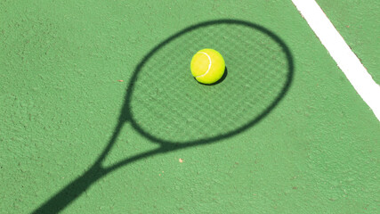 Tennis ball on blue tennis court. the concept of a sporty lifestyle.
