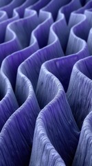 Obraz premium A close-up image of a patterned fabric with a gradient of blue shades
