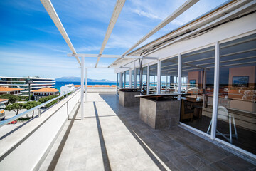 Balcony of a modern house with terrace and sea view
